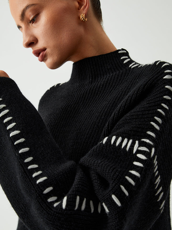 Alma | Suéter de cuello alto oversize con detalles de piqué